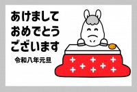 炬燵でくつろぐ白…