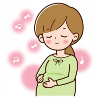 音楽を聴く妊婦さ…