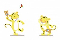 羽子板で遊ぶトラ