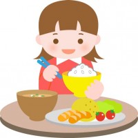 食事をする子ども…