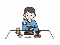 ご飯を食べる男の…